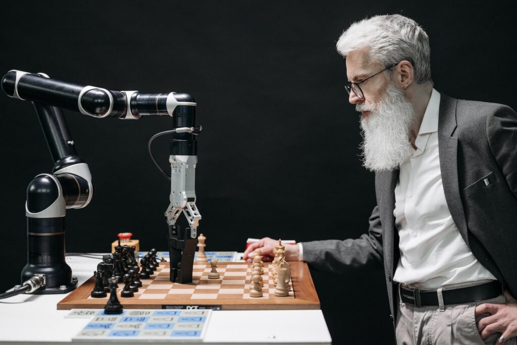 a bearded man playing chess